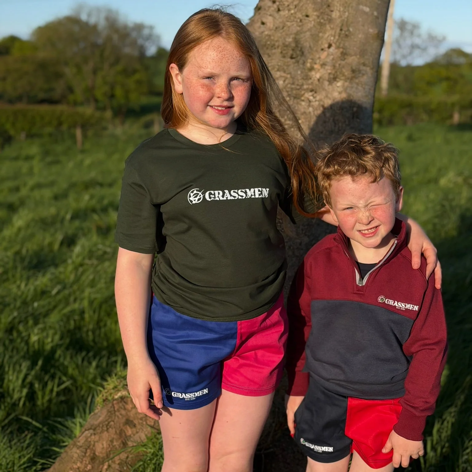 GRASSMEN Red & Navy - Kids Unisex Harlequin Two Toned Shorts - Image 3
